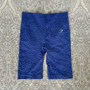 Blue patterned mid thigh gymshark shorts